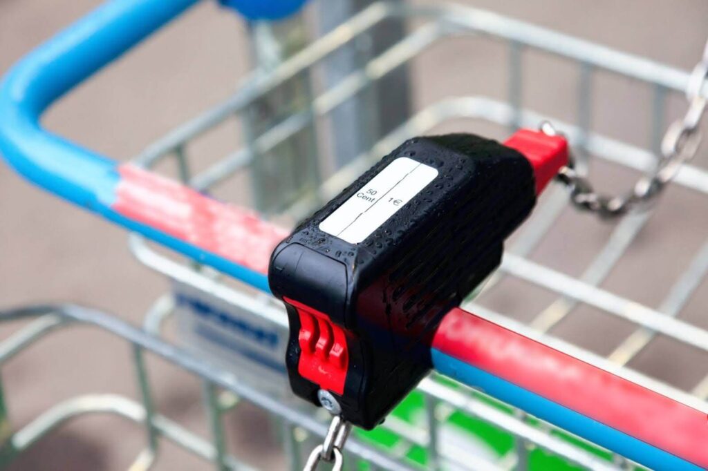 Shopping cart locked at a grocery store.