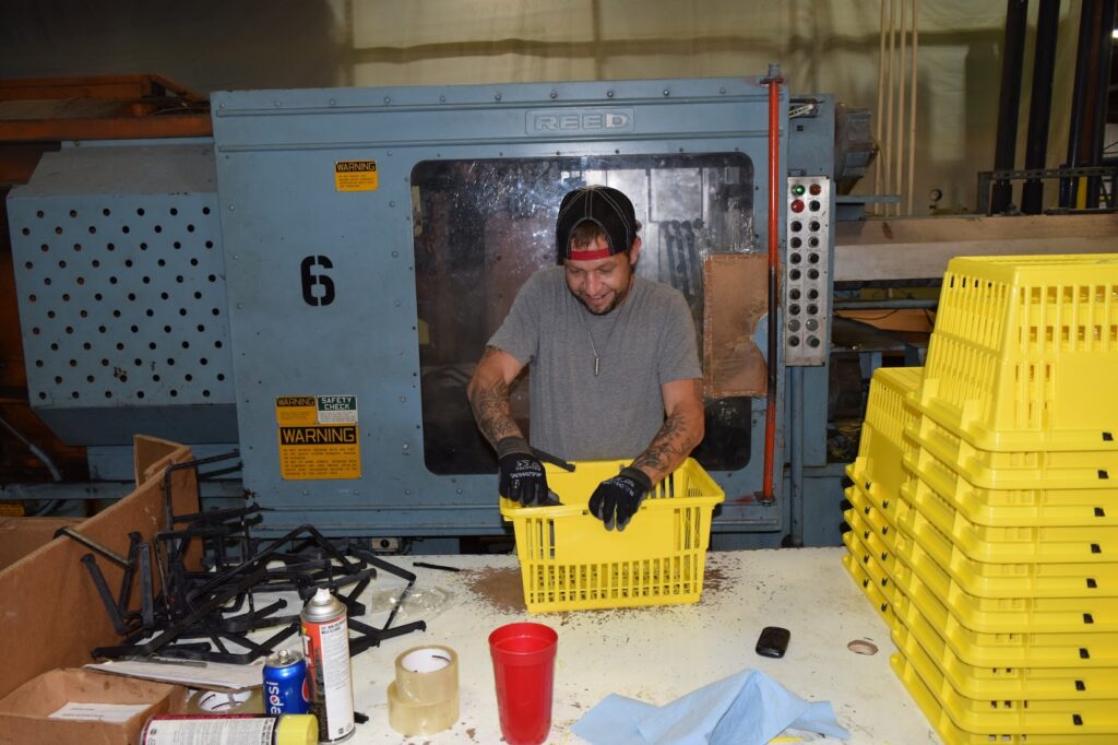 Man putting together a hand basket