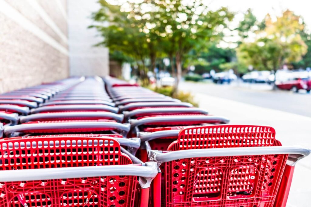 Red shopping carts outside of a store