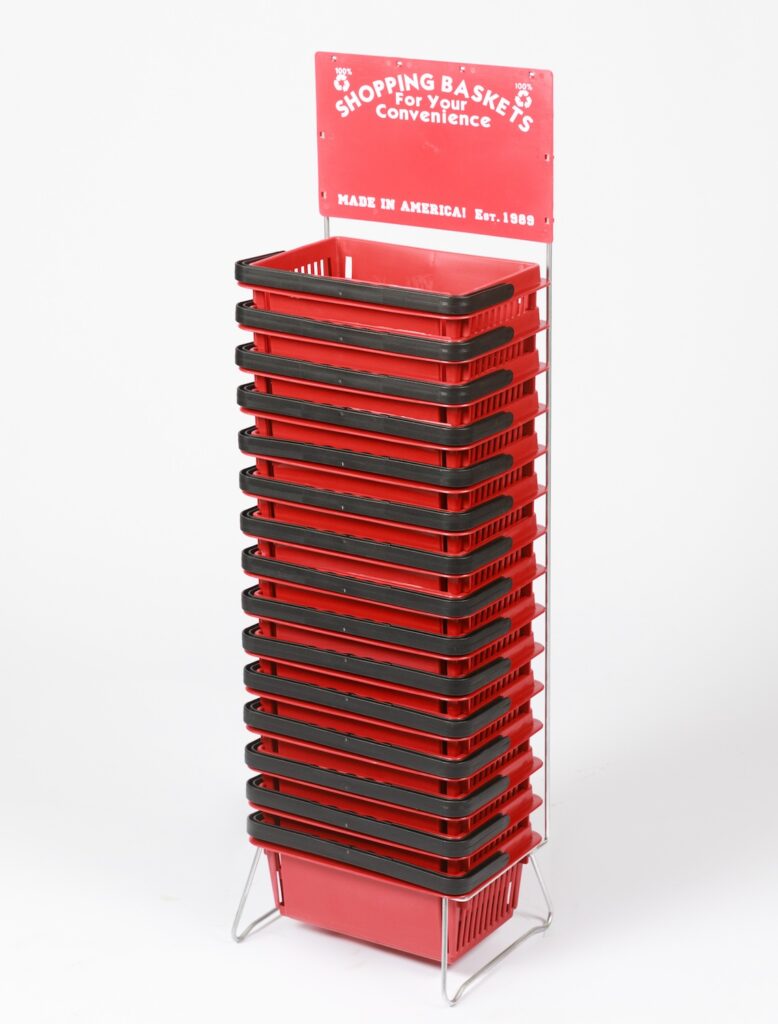 Stack of red shopping baskets.