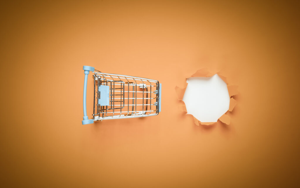 Shopping cart on orange floor