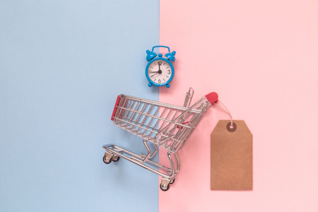 Shopping cart with pink and blue background
