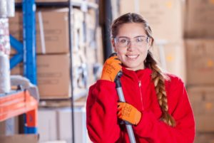 Woman worker in storage